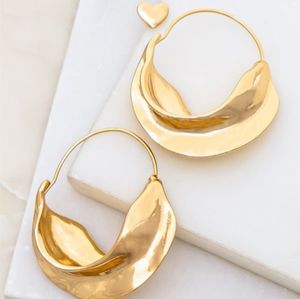 Earring set with gold nugget hoop and heart stud.